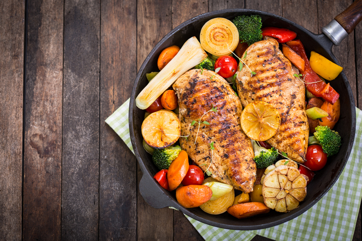 Grilled chicken and vegetables in the pan