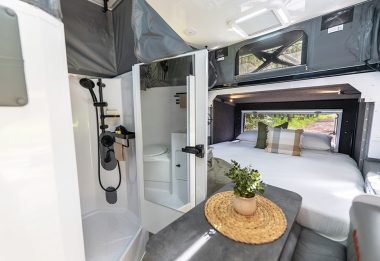 06-austrack-tanami-X13B-interior-poptop-lifestyle-main-king-bed-ensuite-shower-toilet